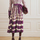 Regal Charm: Purple Patterned Shirt Dress with Bold Elegance