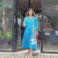 Chic in Blue: Effortless Elegance with a Pop of Red Dress